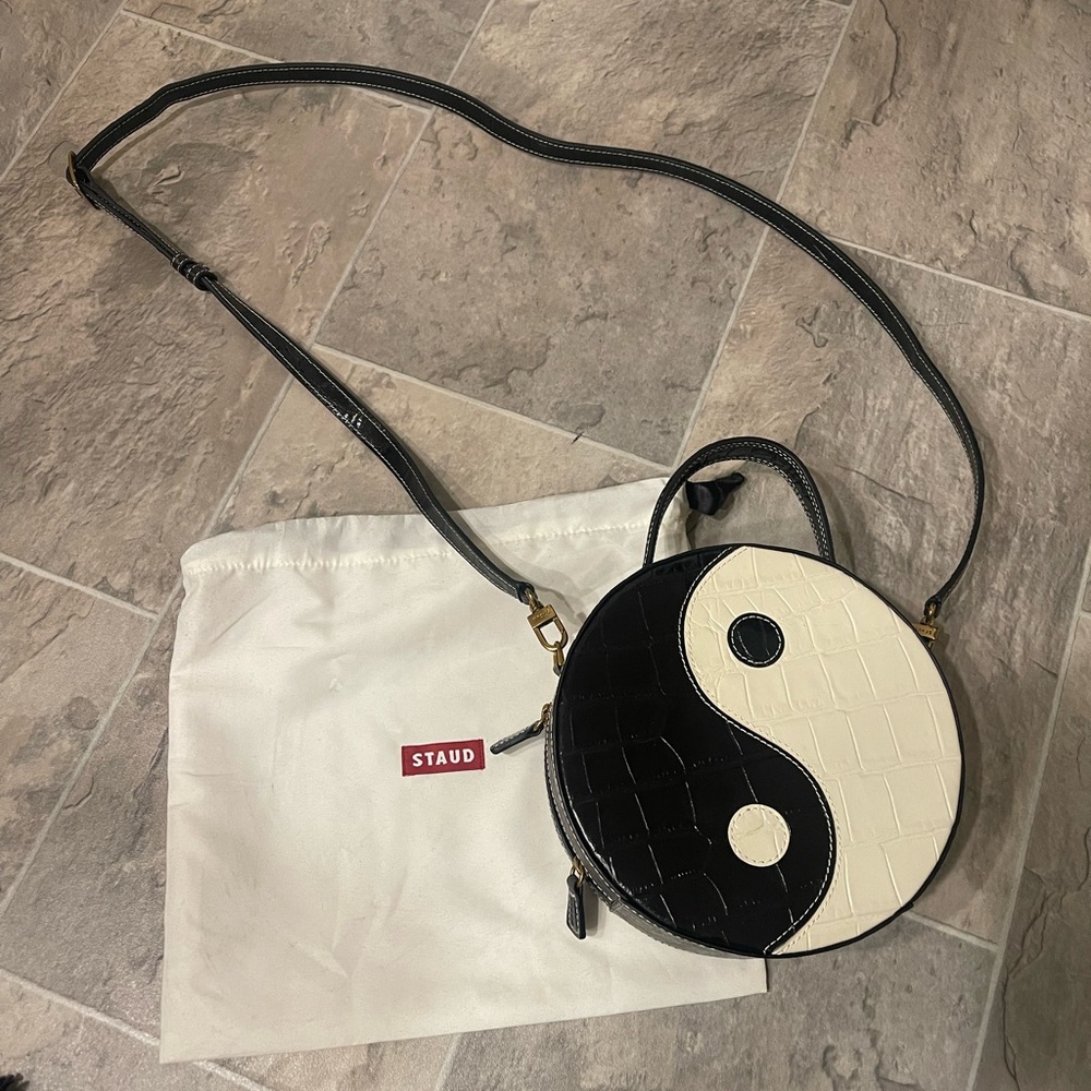 STAUD Yin Yang Crossbody Bag in Black and Cream
